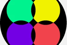 überlappender grüner, gelber, lila und roter Kreis in einem schwarzen Kreis