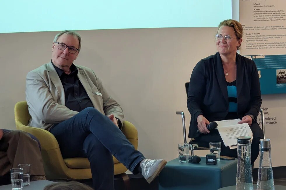 Jens Binner und Moderatorin